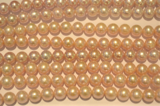 Freshwater pearl strands: pink round lustrous 9-10mm