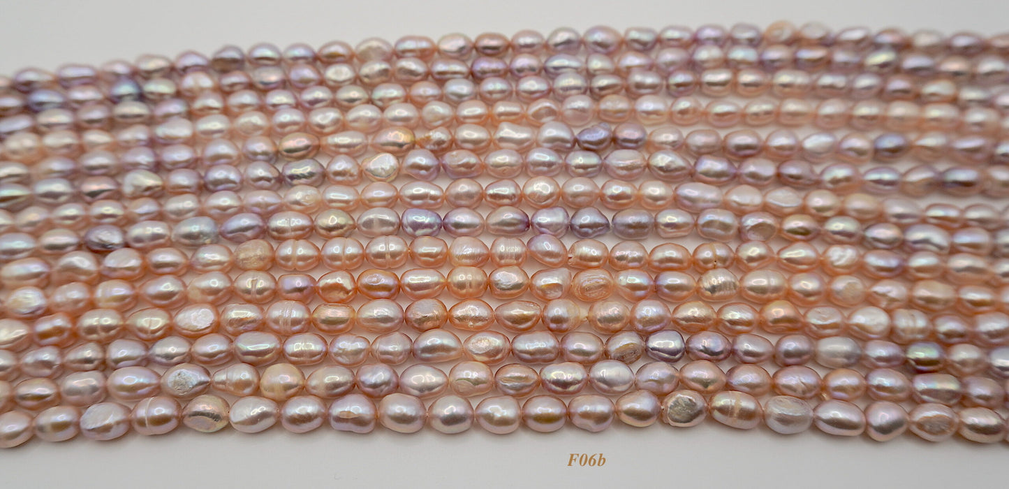 Freshwater pearl strands: pink/mauve semi-baroque 6-7×7-8mm irregular oval