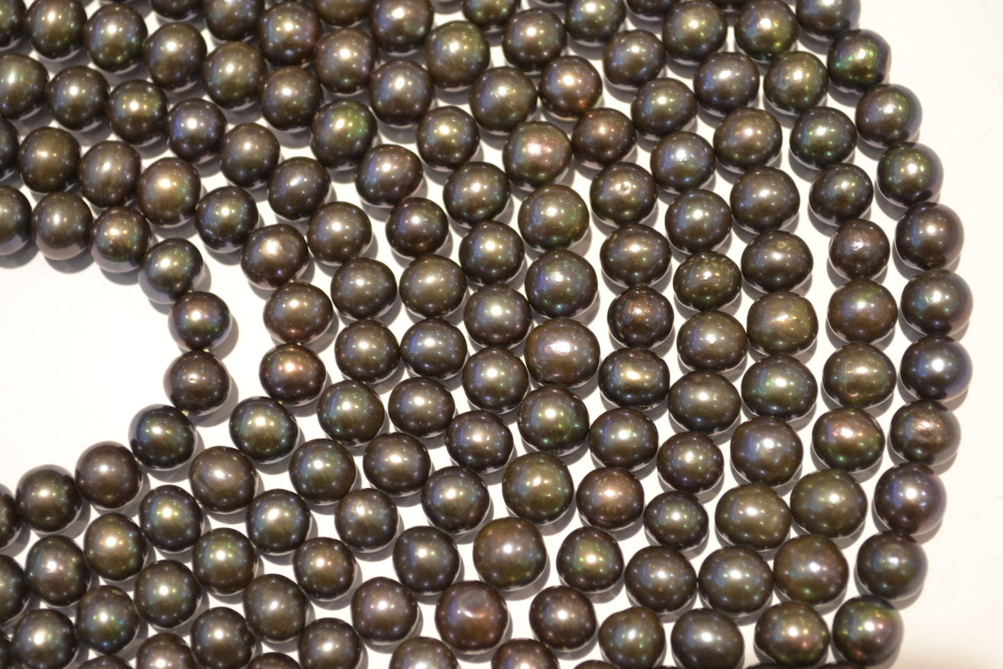 freshwater pearl strands: black greenish/purplish round shiny 7-7.5mm