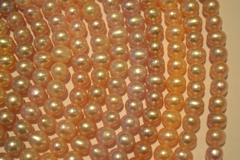 Freshwater pearl strands: pink roundish 8x9mm