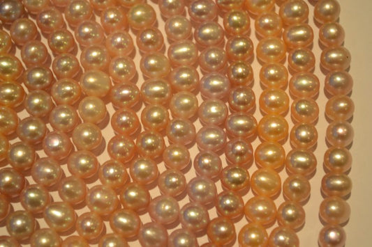 Freshwater pearl strands: pink roundish 8x9mm