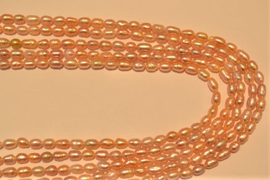 Freshwater pearl strands: pink oval 4-5mmx3mm small rice pearls