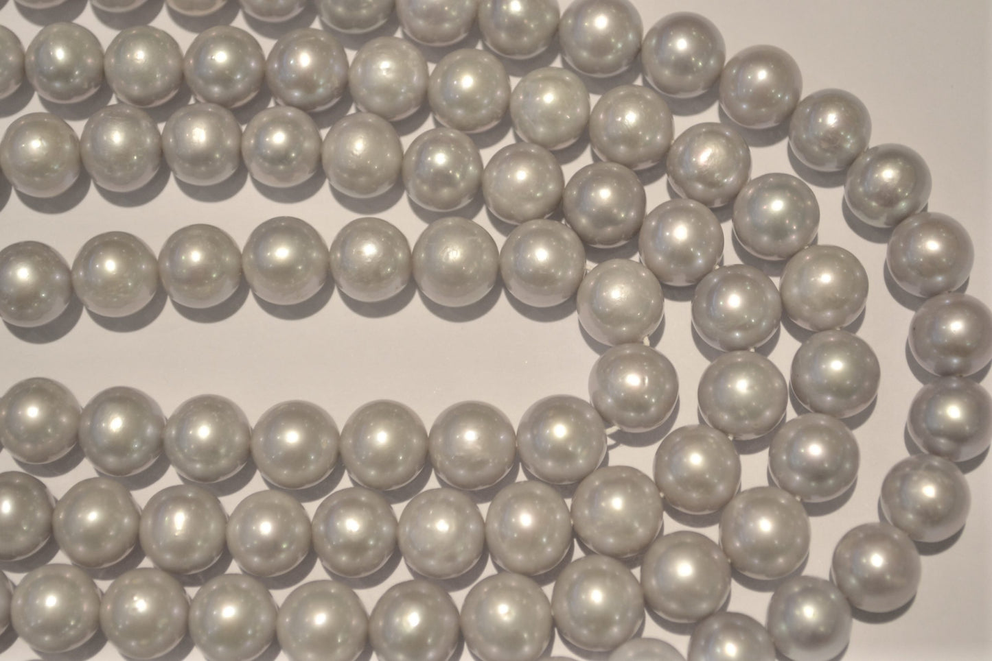 freshwater pearl strands: Grey round 9.5-10.5mm lustrous