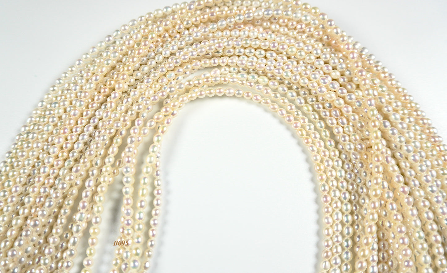 Freshwater Akoya Pearls strand: 3x3.5 to 3.4x4mm small oval top grade pearls