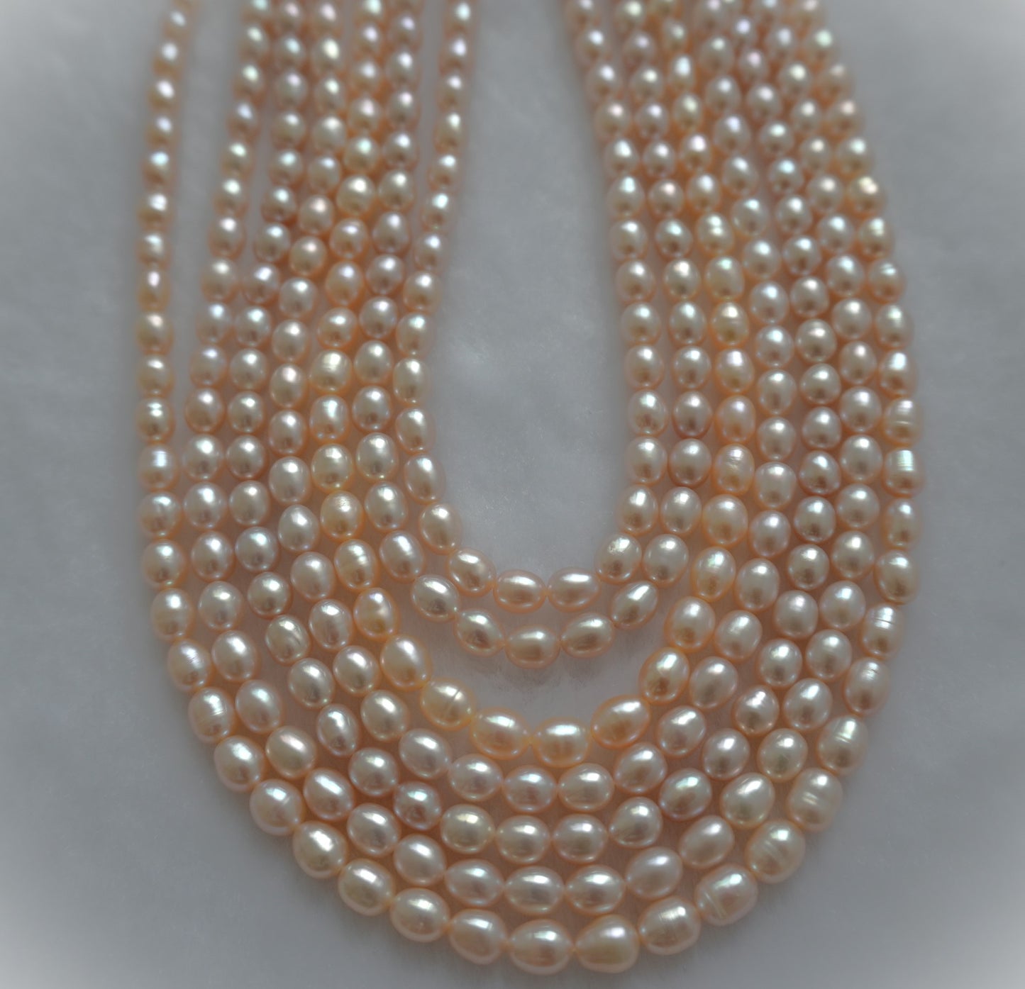 Freshwater pearl strands: pink purple oval 5-5.5×5.5-6mm very shiny