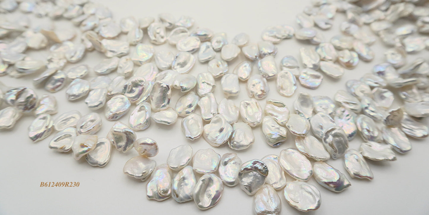 Freshwater pearl strands: silver-grey Keshi large 11×12-13x14mm lustrous