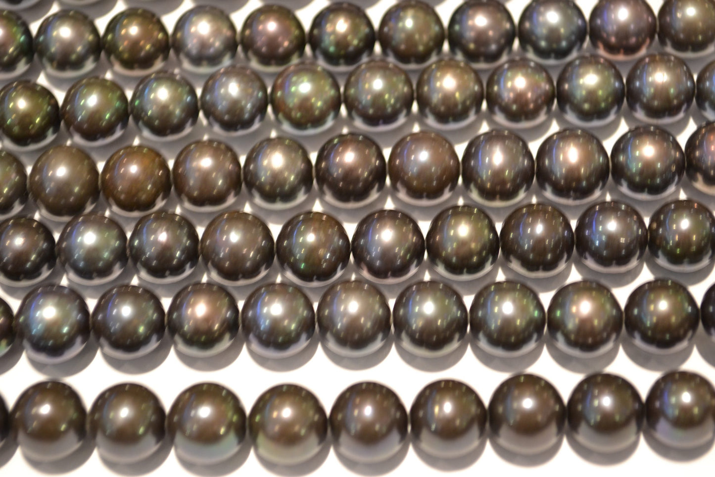 freshwater pearl strands: black purplish/greenish round shiny lustrous 9.5-10.5mm