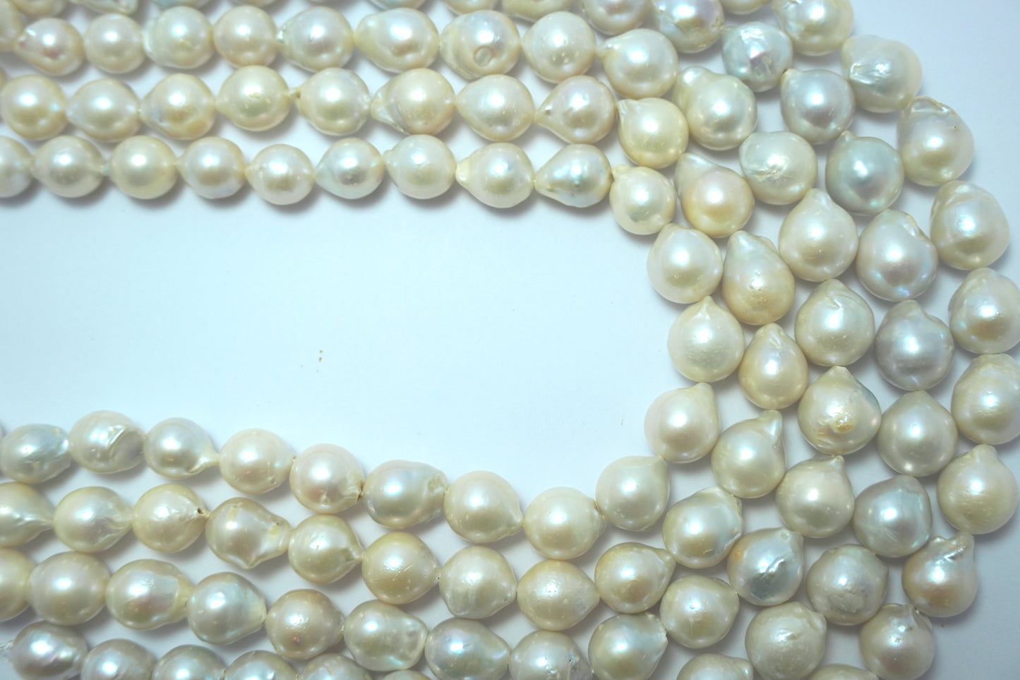 Freshwater pearl strands: Baroque white oval 10.5x13.5mm high grade